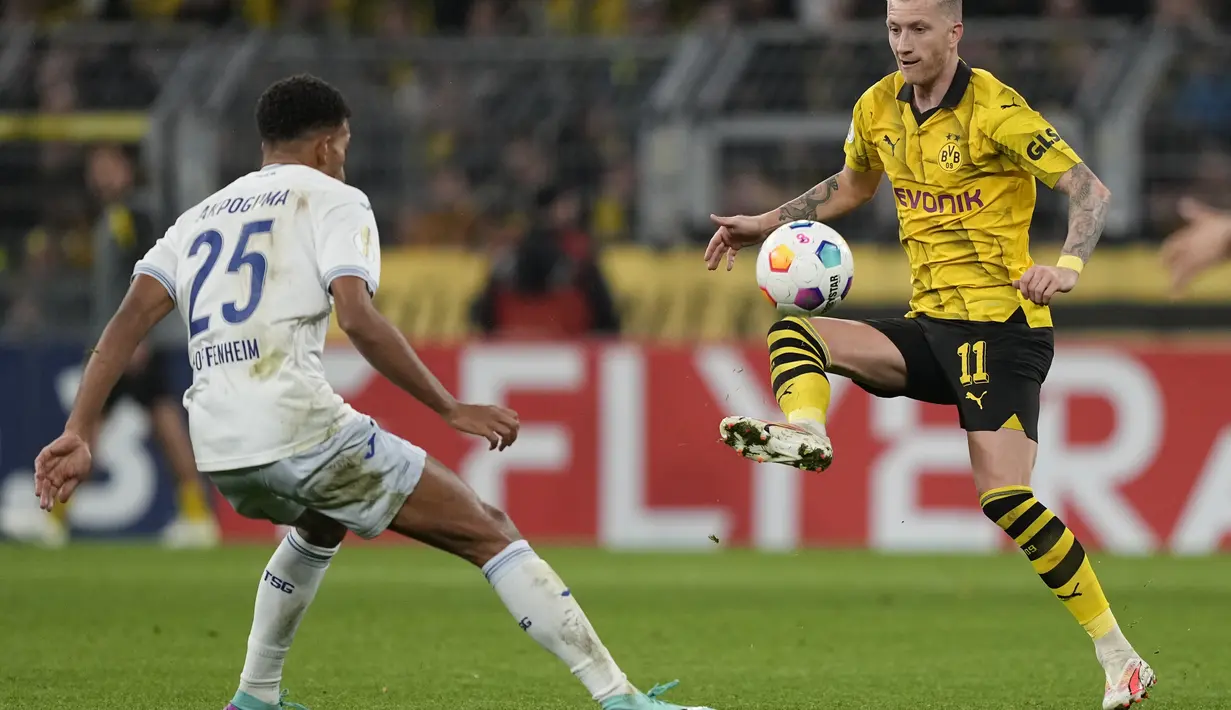 Gol yang ditorehkan Marco Reus mengantarkan Dortmund melaju ke babak 16 besar DFB Cup. (AP Photo/Martin Meissner)