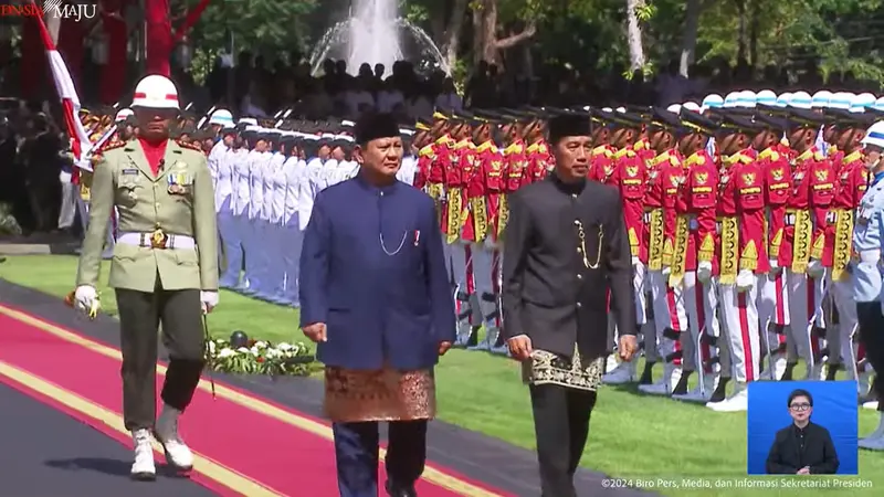 Jokowi dan Prabowo menggelar upacara pisah sambut di Istana Merdeka, Jakarta, Minggu (20/10/2024).