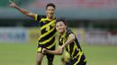 <p>Pemain Timnas Malaysia U-19, Muhammad Haikal melakukan selebrasi usai mencetak gol ke gawang Timnas Vietnam U-19 pada laga semifinal Piala AFF U-19 2022 di Stadion Patriot Candrabhaga, Bekasi, Rabu (13/7/2022). (Bola.com/M Iqbal Ichsan)</p>