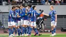 Timnas Jepang yang tergabung di Grup B putaran kedua Kualifikasi Piala Dunia 2026 Zona Asia bersama Myanmar, Suriah dan Korea Utara, sukses menyapu bersih 6 laga dengan kemenangan tanpa kebobolan satu gol pun dengan menceta total 24 gol. Mengoleki 18 poin, Jepang lolos ke putaran ketiga bersama Korea Utara di peringkat kedua dengan koleksi 9 poin. (AFP/Yuichi Yamazaki)