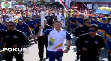 Obor api Asian Games tiba di Sulawesi Selatan, aktor Mario Lawalata dan mantan pebulutangkis Rosiana Tendean jadi pembawa obor.