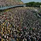 Para pejabat mengatakan sekitar 50.000 orang menghadiri misa yang dipimpin oleh Paus Fransiskus di Edmonton, Kanada (Foto: AFP/Patrick T. FALLON)