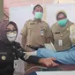 Bupati Grobogan, Sri Sumarno gagal vaksin Covid-19 karena tensi darah tinggi yang mungkin disebabkan, seperti diakuinya, takut disuntik. (Foto: Liputan6.com/Felek Wahyu)