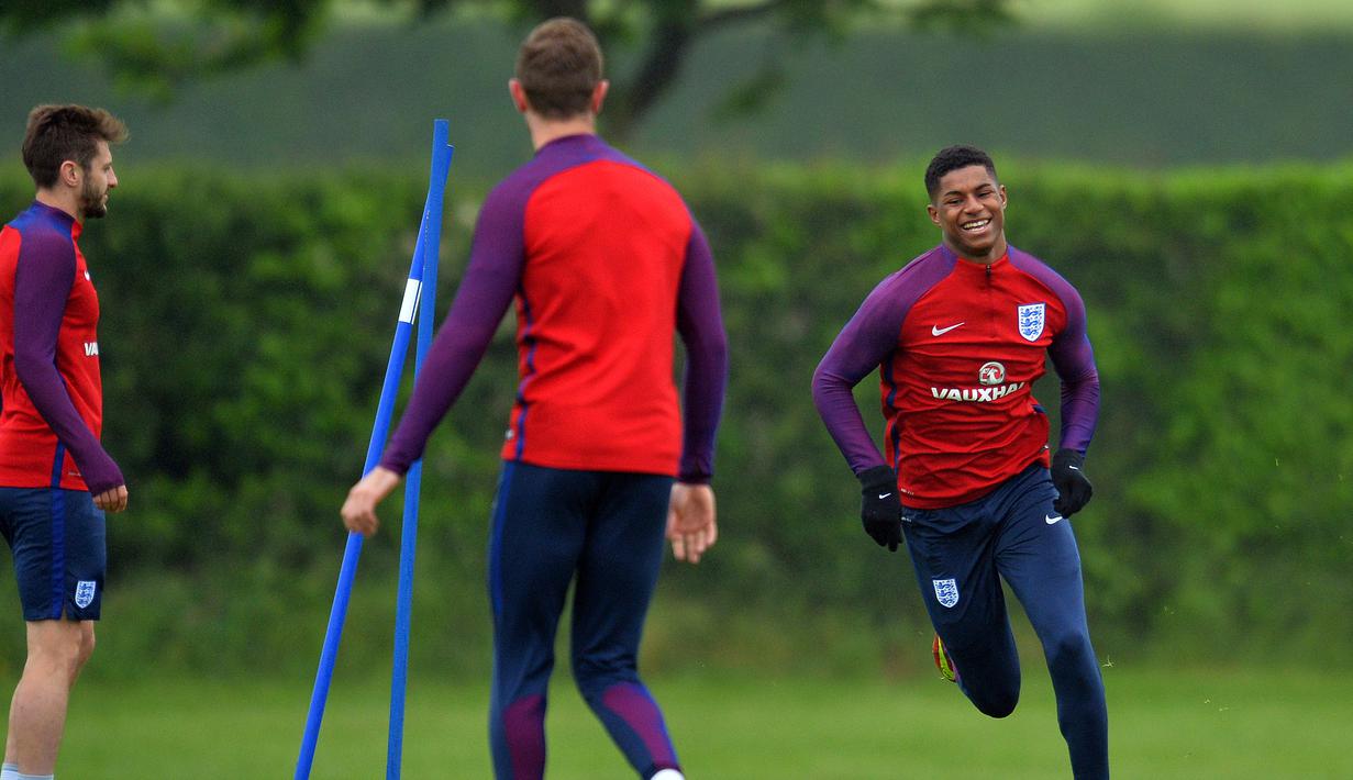 Marcus Rashford masih berusia 18 tahun dan menjadi pemain termuda di skuat Inggris. Penampilan cemerlangnya bersama Manchester United membuat pelatih Inggris, Roy Hodgson, memanggilnya untuk tampil di Piala Eropa 2016. (AFP/Glyn Kirk)