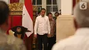 Presiden Joko Widodo didampingi Wakil Presiden Jusuf Kalla tiba untuk memimpin Sidang Kabinet Paripurna di Istana Negara, Jakarta, Kamis (3/10/2019). Topik Sidang Kabinet Paripurna tersebut  yakni Evaluasi Pelaksanaan RPJMN 2014-2019 dan Persiapan Implementasi APBN 2020. (Liputan6.com/Angga Yuniar)