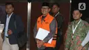 Diketahui, Maidi terjaring Operasi Tangkap Tangan (OTT) KPK dan resmi ditetapkan sebagai tersangka pada Januari 2026. Tampak dalam foto, Wali Kota Madiun nonaktif, Maidi, sesaat sebelum meninggalkan Gedung Merah Putih Komisi Pemberantasan Korupsi (KPK) usai menjalani pemeriksaan lanjutan, Jakarta, Kamis (23/4/2026). (Liputan6.com/Helmi Fithriansyah)
