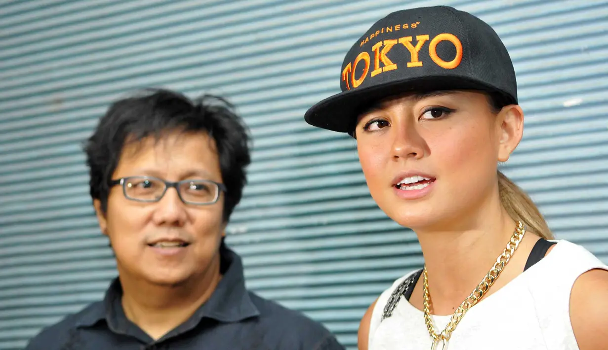 Agnes yang berkolaborasi dengan Erwin Gutawa di HUT SCTV ke-25 ini setiap tampil untuk bernyanyi selalu disertai dengan tarian yang enerjik. (Deki Prayoga/Bintang.com)