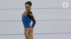 Pesenam Malaysia, Farah Ann, saat beraksi pada nomor all-round individual putri cabang senam SEA Games 2019 di Kompleks Rizal Memorial, Senin (2/12/2019). Atlet cantik ini berhasil menyumbangkan medali emas. (Bola.com/M Iqbal Ichsan)