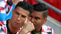 Hal ini tak lepas dari kesimpangsiuran nasib Cristiano Ronaldo yang masih berhasrat pergi dari Old Trafford usai Setan Merah tak lolos ke Liga Champions musim ini. (AFP/Adrian Dennis)