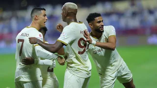 Foto: Ronaldo dan Talisca Kompak Cetak Brace, Al Nassr FC Lumat Al Adalah Lima Gol Tanpa Balas
