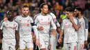 Ekspresi pemain Liverpool saat pertandingan usai pada leg 1, babak semifinal Liga Champions yang berlangsung di Stadion Camp Nou, Barcelona, Kamis (2/5). Barcelona menang 3-0 atas Liverpool. (AFP/Jose Jordan)