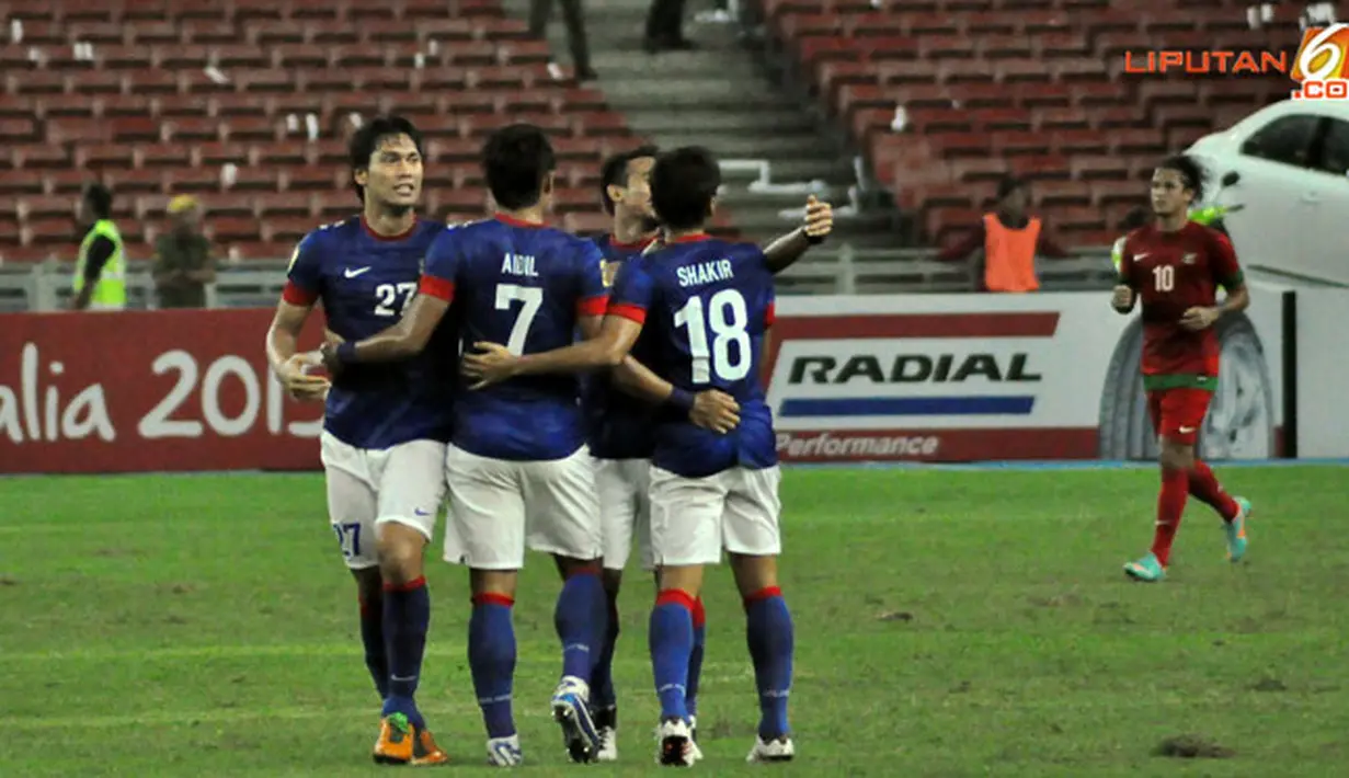 Pemain Malaysia luapkan kegembiraan usai mencetak gol ke gawang Indonesia dalam Laga Piala AFF Suzuki 2012 antara Malaysia vs Indonesia di Stadion Bukit Jalil, Kuala Lumpur, Malaysia. pertandingan berakhir dengan skor 2-0 untuk Malaysia.