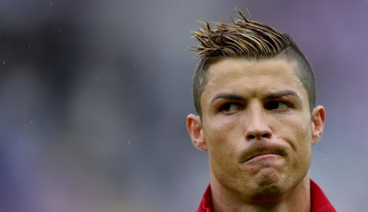 Penampilan baru Cristiano Ronaldo saat memperkuat Portugal melawan Kroasia, 10 Juni 2013. (AFP/Fabrice Coffrini)