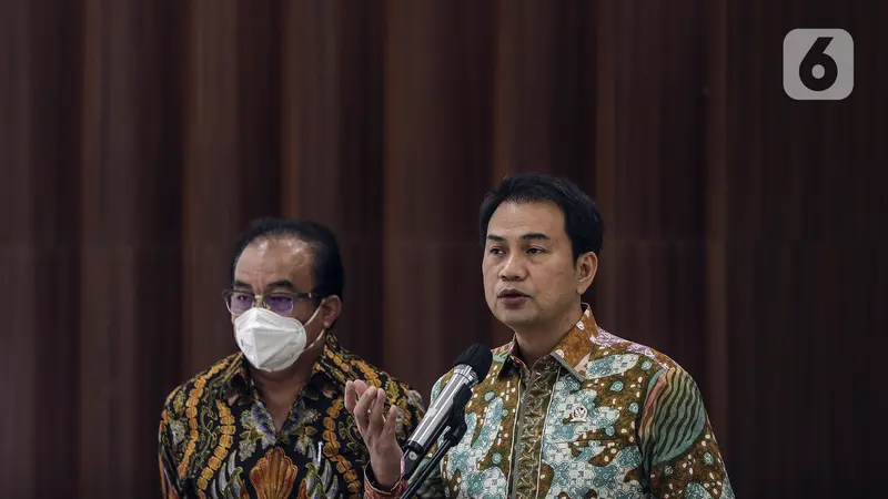 Wakil Ketua DPR Azis Syamsuddin (kanan)