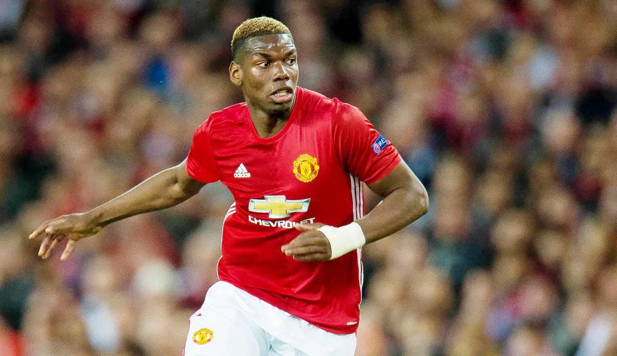 2. Paul Pogba (Gelandang) - 290.000 poundsterling per pekan. (EPA/Peter Powell)