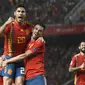 Gelandang Timnas Spanyol, Marco Asensio (kiri), meluapkan kegembiraan usai mencetak gol ke gawang Kroasia, pada laga UEFA Nations League Liga A Grup 4, Selasa (11/9/2018) waktu setempat, di Stadion Manuel Martinez Valero, kota Elche.  (AFP / Jose Jordan)