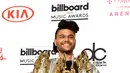 Penyanyi The Weeknd memborong tujuh trofi di penghargaan Billboard Music Awards. Top Streaming Song, R&B Artist, Top Songs Artist, Top Radio Songs Artist dan masih banyak lagi. (AFP/Bintang.com)