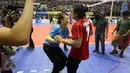 Ekspresi kegembiraan pelatih tim voli Jakarta Elektrik PLN usai menjadi juara dalam Grand Final Proliga 2017 di GOR Among Rogo, Yogyakarta (23/4). Ini adalah gelar ketiga yang diraih Jakarta Elektrik secara beruntun. (Liputan6.com/Johan Tallo)