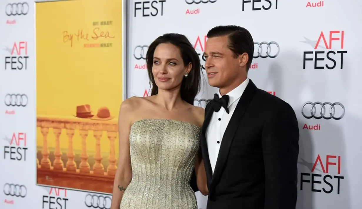 "Mereka tak kembali bersama, namun bukan berarti mereka tak bisa merayakan Natal sebagai sebuah keluarga," ujar seorang sumber pada OK! Magazine. (KEVIN WINTER / GETTY IMAGES NORTH AMERICA / AFP)