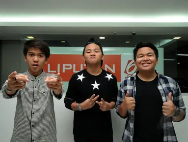 Tiga personil CJR berkesempatan mengunjungi markas Liputan6.com di Jakarta, Senin (22/12/2014). (Liputan6.com/Helmi Fithriansyah)