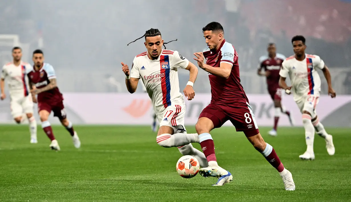 Sebelumnya, The Hammers hanya mampu memetik hasil imbang di London pada leg pertama. Namun, kali ini mereka mampu memberikan kejutan dengan mengalahkan Lyon dengan skor 3-0. (AFP/Jeff Pachoud)
