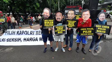 Massa dari Koalisi Untuk Reformasi Polri melakukan aksi simpatik "Pilih Kapolri Bersih" saat Car Free Day, Jakarta, Minggu (18/1/ 2015). (Liputan6.com/Miftahul Hayat)