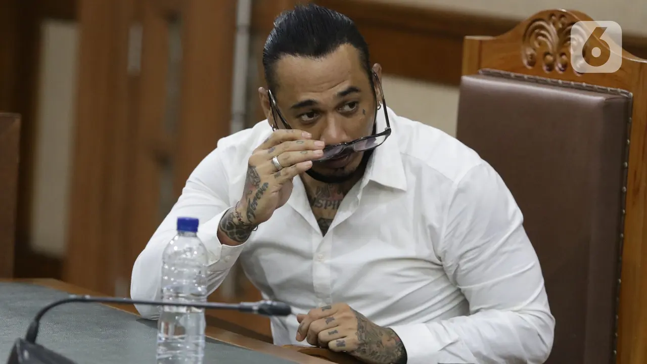 FOTO: Kasus Pengancaman, Jerinx SID Divonis Satu Tahun Penjara dan Denda Rp 25 juta
