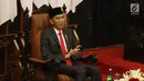 Presiden Joko Widodo atau Jokowi saat menghadiri pelantikan anggota DPR, MPR, dan DPD di Kompleks Parlemen, Jakarta, Selasa (1/10/2019). Para wakil rakyat yang terpilih dalam Pemilihan Umum 2019 dilantik hari ini. (Liputan.com/JohanTallo)