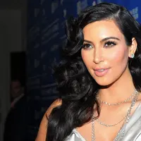 Bukan Kim Kardashian kalau tidak menjadi pusat perhatian masyarakat. Banyak yang memuji, banyak pula yang memberikan hujatan kepadanya. Terlebih para haters yang seringkali mengomentarinya. (AFP/Alberto E.Rodriguez)