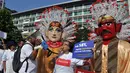 Aksi Dukung Pilkada Langsung ini juga dilakukan serentak di beberapa kota besar lainnya seperti Aceh, Bandung, Makassar, dan Semarang, (14/9/14). (Liputan6.com/Miftahul Hayat)