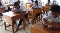 Ujian Semester Berbasis Andoid. Dok: Telkomsat