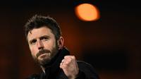 Michael Carrick saat menjadi pelatih Middlesbrough merayakan kemenangan di akhir pertandingan perempat final Piala Liga Inggris melawan Port Vale di Vale Park, Stoke-on-Trent, Inggris tengah, pada 19 Desember 2023. Manchester United (MU) resmi mengumumkan Michael Carrick sebagai pelatih kepala mengisi posisi Ruben Amorim yang dipecat pada 5 Januari 2026. (Oli SCARFF/AFP)