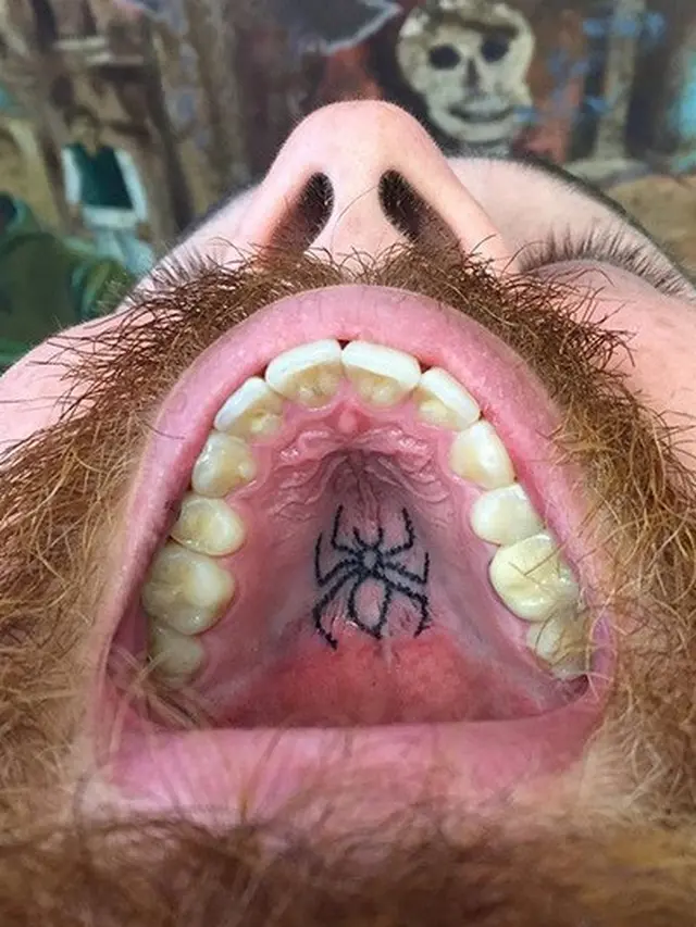 tato di dalam mulut
