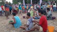Bangkitkan semangat pengungsi Lombok dengan aneka lomba dan permainan.