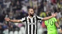 Gonzalo Higuain mencetak gol pertamanya di musim ini dalam kemenangan Juventus 3-0 atas Chievo, Sabtu (9/9/2017). (AFP / MIGUEL MEDINA)