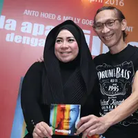 Suksesnya film AADC yang pertama, membuat suami istri ini merasa tertantang dengan penggarapan album AADC2 dibawah naungan label Aquarius Musikindo tersebut. (Andy Masela/Bintang.com)