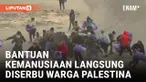 Warga Palestina langsung berebut bantuan kemanusiaan yang datang di Kota Rafah. Sejumlah bantuan pun sampai terjatuh dari truk pengangkut.