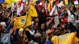 Mahasiswa yang tergabung dalam organisasi atau gerakan kemahasiswaan saat acara Apel Kebangsaan Mahasiswa Indonesia di Tugu Proklamasi, Jakarta, Kamis (3/11). (Liputan6.com/Johan Tallo)