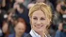 Julia Roberts akan tetap menawan dengan kecantikan natural. Bahkan ia menganggap meski dirinya buruk, itu adalah dirinya sendiri. Ia ingin anaknya mengerti setiap situasi yang ia alami. (LOIC VENANCE / AFP)