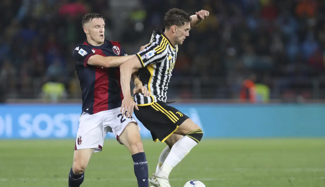 

<p>Bologna dan Juventus harus berbagi angka usai bermain imbang 3-3. (Michele Nucci/LaPresse via AP)</p>
<p>” class=”js-lazyload read-page–photo-tag–slider__picture-lazyload” data-template-var=”image”/></picture>
<div class=