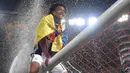 4. Juan Cuadrado, pelatih AC Milan, Vicenzo Montella, berupaya reuni dengan mantan pemainnya di Fiorentina itu. Menurut London Evening Standard, jika ingin membawanya dari London, Milan harus menyiapkan dana sekitar 15 juta pounds. (AFP/Tiziana Fabi)