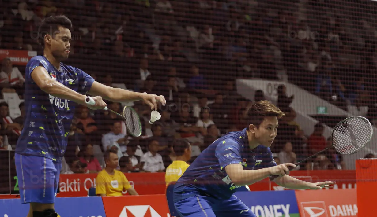 Pasangan Liliyana Natsir dan Tontowi Ahmad, saat melawan Riky Widianto dan Masita Mahmudin pada laga Indonesia Masters 2018 di Istora Senayan, Selasa (23/1/2018). Liliana/Tontowi menang 23-21 dan 21-17 atas Riky/Masita. (Bola.com/M Iqbal Ichsan)