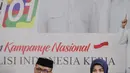 Direktur Konten TKN Jokowi-Ma'ruf Amin, Fiki Satari (kiri) memberikan keterangan terkait OTT KPK terhadap Ketum PPP Romahurmuziy, Jakarta, Jumat (15/3). TKN mengaku terkejut dengan kasus yang terjadi pada Romahurmuziy. (Liputan6.com/Faizal Fanani)