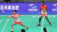 Tontowi Ahmad / Liliyana Natsir lolos ke babak kedua Kejuaraan Asia Bulu Tangkis 2018 yang berlangsung di Wuhan Sports Center, Tiongkok, Rabu (25/4/2018) pagi WIB. (Humas PB PBSI)