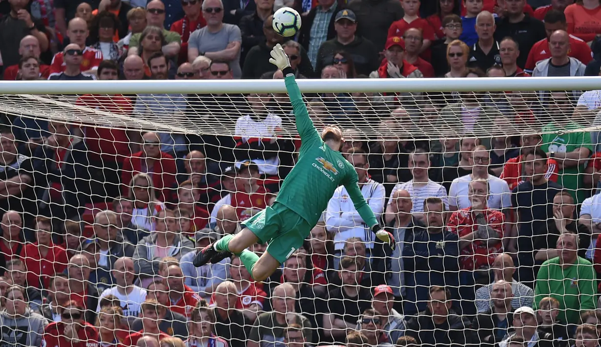 Pada musim ini, kiper Spanyol itu mampu tampil apik bersama Setan Merah di Premier League. Ia berhasil mencatatkan 9 clean sheet dari 24 pertandingan. (Foto: AFP/Pool/Oli Scarff)
