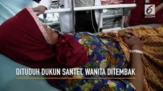 Seorang ibu paruh baya ditembak dua pria bertopeng yang menyangka korban sebagai dukun santet. Dokter temukan dua peluru bersarang di dada korban.