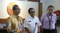 Pimpinan KPK Saut Situmorang dan Alex Marwata bertemu Menteri Dalam Negeri Tito Karnavian di kantor Kemendagri, Jakarta, Rabu (30/10/2019). (Liputan6.com/Putu Merta Surya Putra)