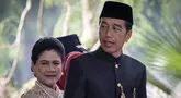 Presiden Joko Widodo dengan mengenakan baju adat Betawi tiba untuk menghadiri Sidang Tahunan MPR, Sidang Bersama DPR dan DPD tahun 2024 di kompleks Parlemen, Senayan, Jakarta, Jumat (16/8/2024). (Yasuyoshi CHIBA / AFP)