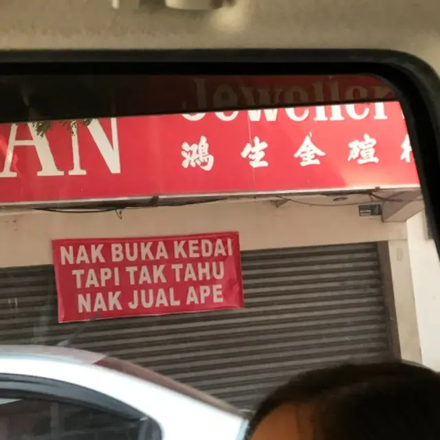 spanduk warung nyeleneh