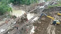 Menteri Pekerjaan Umum (PU) Dody Hanggodo meninjau lokasi banjir di Desa Papanrejo Kecamatan Gubug Kabupaten Grobogan Jawa Tengah pada Selasa (28/1/2025) (dok: PU)